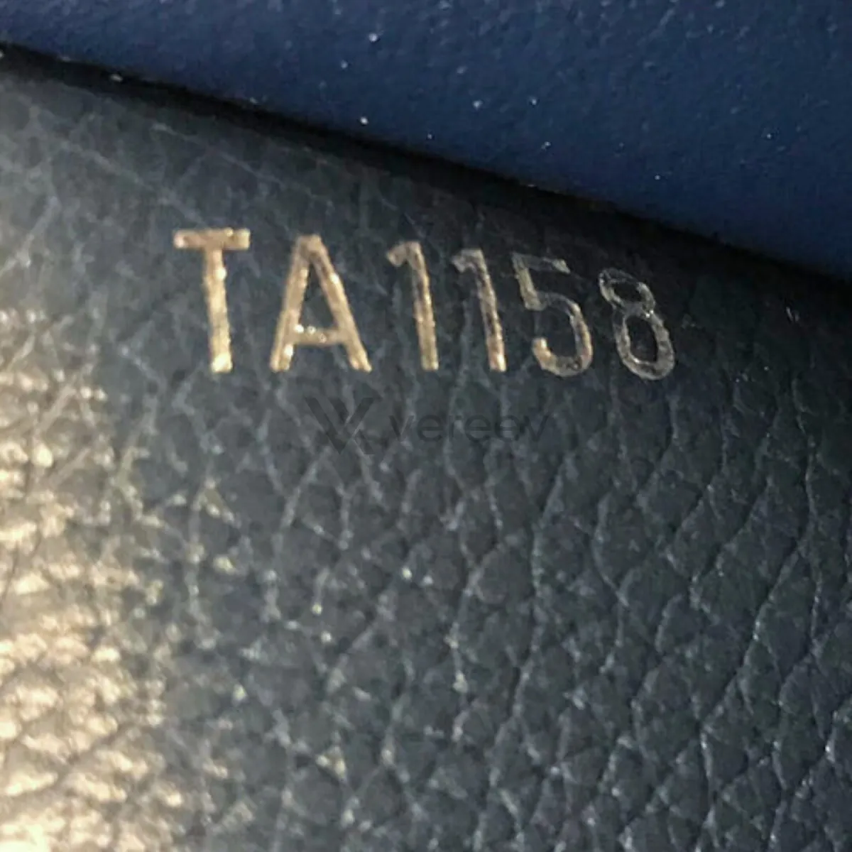 Sample photo 5, Stamp: the date code stamped inside the wallet
